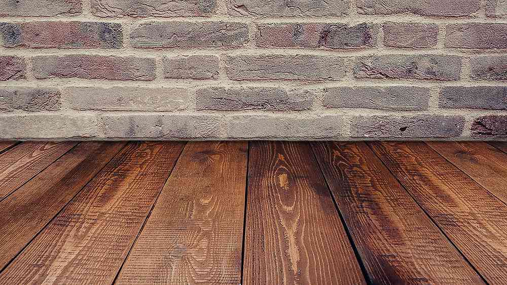 Sealing the gaps in floorboards can prevent heat loss. 