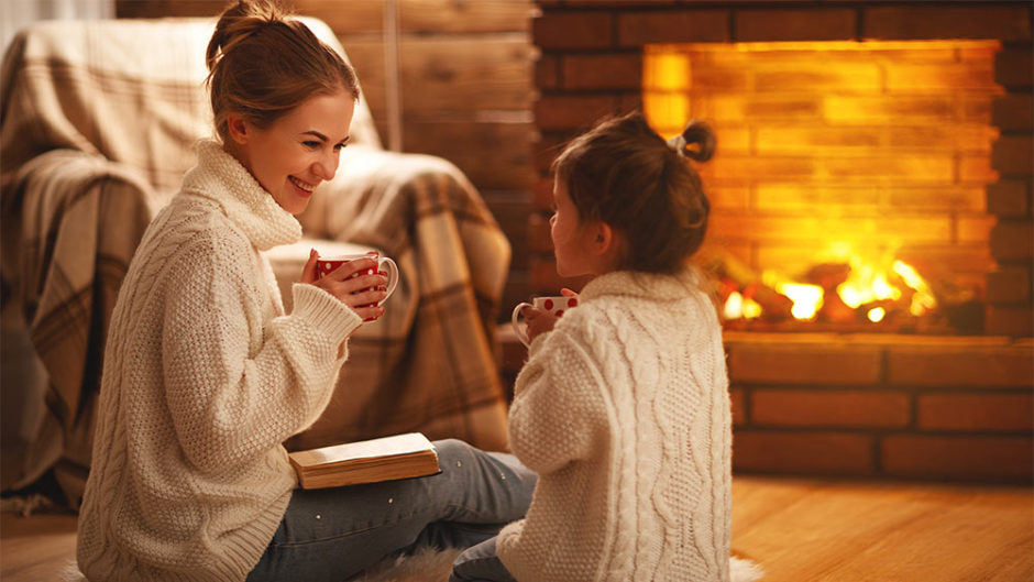 Girls enjoying hot chocolate in winter season